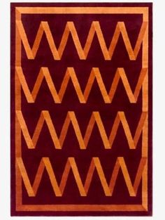 an orange and red rug with wavy lines on it's sides, in the shape of zigzag