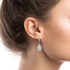 A simple and universally flattering teardrop shaped crystal drop earring is the perfect finishing touch on your wedding day. Our simulated diamonds are AAA+ quality for maximum sparkle. Length: 1 1/4", Width: 1/2" Stones measure 10mm x 14mm 8 carat total weight Carat total weight based on diamond equivalent Custom gift box and microfiber storage pouch included Aurora Earrings, Teardrop Earrings Gold, Teardrop Bridal Earrings, Silver Bridal Earrings, Gold Bridal Earrings, Custom Gift Boxes, Crystal Drop Earrings, Crystal Drop, Drop Earring