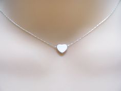 tiny heart Cute Silver Charm Necklace For Valentine's Day, Simple Silver Heart Charm Necklaces, Cute Silver Charm Necklace With Heart Charm, Tiny Silver Necklaces For Mother's Day, Tiny Silver Necklace For Anniversary, Everyday White Sterling Silver Heart Necklace, Simple Silver Heart Charm Necklace, Simple Silver Charm Necklaces For Wedding, Tiny Silver Necklace For Mother's Day