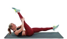 a woman is doing an exercise on a mat