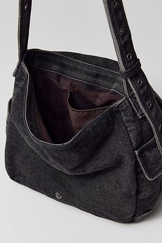 Essential messenger bag crafted from premium BDG denim. Low-profile silhouette with a pocketed flap closure. Lined interior with two pockets and plenty of space for your essentials. Complete with a zip pocket at the back for easy access, plus a water bottle pocket at the side. Finished with an adjustable strap - wear it on your shoulder or crossbody. Urban Outfitters exclusive. Features BDG denim messenger bag Washed soft denim with tons of storage Plenty of pockets inside and out Water bottle p Cute School Messenger Bags, Black Over The Shoulder Bag, Chic Cheap Faux Leather Hobo Bag, 2000s Messenger Bag, Black Denim Travel Bag, Black Hobo Bag With Pockets For Everyday Use, Denim Hobo Bag With Pockets For Travel, Dark Wash Shoulder Bag With Pockets For Everyday Use, Black Denim Travel Shoulder Bag