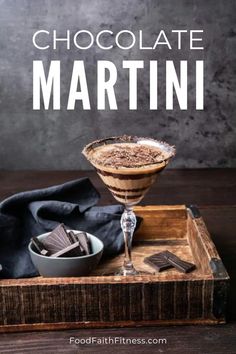 chocolate martini in a glass on top of a wooden tray with the words chocolate martini