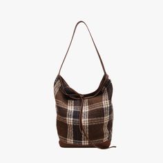 The Plaid Bucket Bag is a unique shoulder bag made for everyday use. Crafted from our Premium Vegan Leather and woolen fabric. A main compartment opens up to a spacious interior that can comfortably fit your everyday essentials like phone, iPad and small water bottle. Perfect for work, travel or even just a casual day Micro Bags, Small Water Bottle, Plaid Design, Work Travel, Wallet Bag, Earrings Collection, Bag Straps, Leather Trims, Bag Making