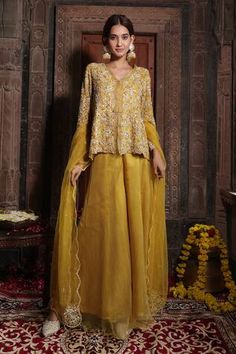 Yellow jacket style kurta with thread embroidered blossom vine motifs, embellished by beads and swarovski. Comes with sharara and scalloped border dupatta. - Aza Fashions Wedding Sharara With Gota Work And Long Sleeves, Chanderi Long Sleeve Palazzo Set For Reception, Long Sleeve Chanderi Palazzo Set For Reception, Silk Sharara With Long Sleeves For Reception, Long Sleeve Palazzo Set For Reception And Festivals, Jacket Sharara, Radhika Madan, Genelia D'souza, Rhea Kapoor