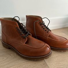 Never Worn. Brown Leather Lace-Up Boot. Dark Brown Laces. Brown Leather Dress Shoes For Fall, Brown Chukka Boots With Goodyear Welt And Almond Toe, Brown Casual Chukka Boots With Goodyear Welt, Brown Round Toe Work Boots, Brown Round Toe Work Boots For Workwear, Brown Dress Shoes With Leather Footbed, Brown Dress Shoes With Leather Lining For Fall, Brown Leather Lined Dress Shoes For Fall, Casual Brown Moc Toe Leather Shoes