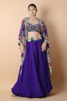 Purple lehenga with floral, thread, beads and pearls embroidered waistband. Comes with a blouse and a cape. - Aza Fashions Designer Hand Embellished Silk Lehenga, Traditional Silk Choli Hand Embellished, Wedding Lehenga Hand Embellished In Multicolor, Hand Embellished Silk Choli For Wedding, Silk Hand Embellished Choli For Reception, Silk Lehenga With Hand Embellished Traditional Drape, Hand Embellished Silk Lehenga With Traditional Drape, Hand Embellished Silk Lehenga, Reception Hand Embellished Georgette Choli