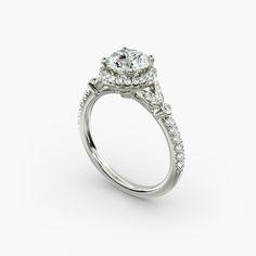 a diamond engagement ring on a white background