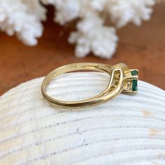 Estate/ vintage 14KT yellow gold ring with oval, genuine emerald + diamond accents. Stunning deep, green color on this emerald. Emerald is the birthstone for May babies + this ring makes a fantastic gift! Size 6.5 Weight: 2.10g Genuine, oval-cut, emerald measures: 6.5mm x 5mm .65~ .70 CT natirual diamonds (6) round diamonds; SI/I clarity; I color Stamped 585 (14K) Excelent estate condition Emerald Rings With Diamond Accents For May Birthstone, Oval Emerald Ring With Diamond Accents For May Birthstone, Heirloom Oval Emerald Ring, Oval Emerald Ring In Gold, Yellow Gold Cluster Ring With Emerald Cut May Birthstone, Yellow Gold Cluster Ring For May Birthstone, Emerald Cut, Emerald Cut Yellow Gold Cluster Ring For May Birthstone, Heirloom Oval Emerald Ring As May Birthstone, Green Diamond May Birthstone Rings