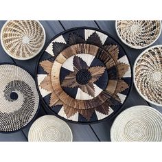 several woven baskets arranged on top of each other