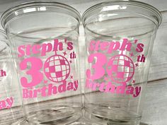 three glasses with the words 30th birthday and 30 th birthday printed in pink on them