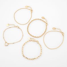 Complete your look of the day with this bracelet set! This mixed set includes 5 different gold-tone chain bracelets to create the perfect arm party. Finish: Gold-tone Length: 6" Closure: Lobster clasp Pack Size: 5 Material: Metal - Claire's Gold Mixed Chain Bracelets - 5 Pack Trendy Gold Beaded Bracelet With Chain, Bracelet Pack, Arm Party, Look Of The Day, Chain Bracelets, Fashionable Jewelry, Simple Bracelets, Jewelry And Accessories, Metal Style