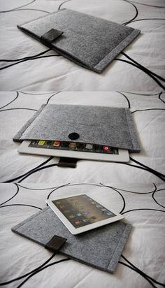 an ipad case is sitting on top of a bed with its cover open and closed