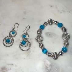 Turquoise Blue Beaded Bracelet & Dangle Earrings Silver Women’s Fashion Jewelry Adjustable Blue Jewelry With Silver Beads, Blue Metal Jewelry With Dangling Beads, Turquoise Jewelry With Silver Beads, Silver Jewelry Sets With Round Beads, Silver Beaded Dangle Jewelry Sets, Adjustable Silver Beaded Jewelry Sets, Nickel-free Light Blue Round Bead Jewelry, Nickel-free Blue Dangle Bracelets, Blue Hypoallergenic Metal Jewelry