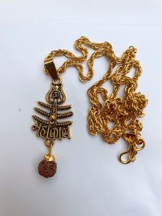 Top Quality/Never Fade/ Divineorigin Brand New Design/Anty-Allegy,1 Pendant is included in this Package,,Height of Pendent is 35 mm (approx.), width is 35 mm (approx.) & Chain Length is 440 mm and Weight is 25 gm.(approx.), Material:Brass & Wood ,Colour:Gold & Brown ,Chain Material:Brass & Wood Wearabiity: Goes well with casual wear, party wear and college wear,Anniversary Gift::Welding Gift::Love Promise Gift::Birthday Gift Special gift on Christmas Gift,Valentine days Friendship Day.Love gifts Festive Temple Necklace With Locket For Puja, Gold Mala As Navratri Gift, Brass Temple Necklace With Latkans For Puja, Temple Necklace With Locket For Diwali Puja, Gold Mala For Navratri Gift, Gold Mala With Tilla For Puja, Diwali Temple Necklace With Locket For Puja, Diwali Puja Temple Necklace With Locket, Handmade Gold Spiritual Mala