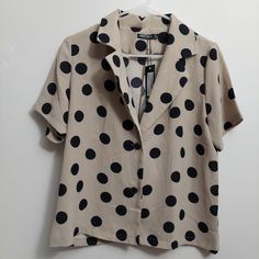 One More Button Hurt Polka Dot Blouse New With Tag. Has Two Button On The Top. Short Sleeve. Dots All Around. Chic Polka Dot Blouse With Buttons, Polka Dot Collared Blouse With Button Closure, Polka Dot Collared Blouse With Buttons, Summer Polka Dot Blouse With Button Closure, Polka Dot Short Sleeve Blouse For Day Out, Polka Dot Blouse With Button Closure For Summer, Polka Dot Collared Top With Button Closure, Casual Polka Dot Blouse With Buttons, Ruffle Top Blouses