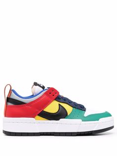 Multicolour Dunk Low Disrupt sneakers from NIKE featuring colour-block panelled design, round toe, front lace-up fastening, perforated detailing, mesh panelling, logo patch at the tongue, signature Swoosh logo detail, pull-tab at the heel, flat sole and platform midsole. Nike Multicolor Skate Shoes For Streetwear, Multicolor Skate Shoes With Rubber Sole For Streetwear, Multicolor Rubber-sole Skate Shoes For Streetwear, Multicolor Low-top Platform Sneakers With Vulcanized Sole, Multicolor Skate Shoes With Rubber Waffle Outsoles For Streetwear, Modern Multicolor Low-top Custom Sneakers, Modern Multicolor Custom Sneakers For Sports, Modern Low-top Basketball Shoes With Rubber Waffle Outsoles, Multicolor Skate Shoes With Boost Midsole For Streetwear