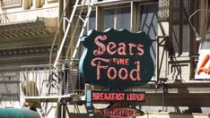 there is a sign that says searss the food