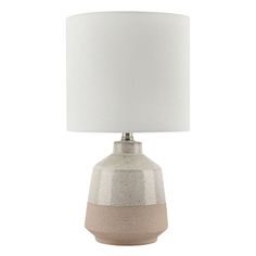 a gray and white table lamp with a white shade on the top, sitting against a white background