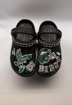 Add Some Sparkle to Your Step When Watching or at the Game with Bling Crocs! Turn heads with every step you take! Our custom Bling Crocs aren't just shoes - they're a statement. Whether you're heading out for a casual day or dressing up your comfy footwear, these Crocs will instantly elevate your style. Here's why these Bling Crocs are a must-have in your wardrobe: ✨ Eye-Catching Design: These Crocs are adorned with dazzling rhinestones and sparkling embellishments, making you the center of attention wherever you go. 👑 Stand Out from the Crowd: Forget ordinary - these Crocs are uniquely designed for those who love to shine. Perfect for festivals, parties, or even a casual outing, these shoes will have people asking, "Where did you get those?" 🌟 Comfort Meets Style: Don't sacrifice comfor Comfy Footwear, Bling Crocs, Custom Bling, Hacks Clothes, Every Step You Take, Fashion Hacks, Fashion Hacks Clothes, Festival Season, Eagles