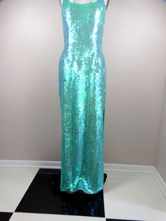 "This is a JAW-DROPPING vintage gown! It's fully embellished with iridescent sequins and in perfect condition! Measurements: Bust - 34\" Waist - 27\" Hips - 36\" Length - 59\" This item comes from a pet-free and smoke-free home. If you would like more info or have any questions, please don't hesitate to ask!" Special Event Outfit, Iridescent Mermaid, Sequined Gown, Iridescent Dress, Carpet Outfits, Classic Dresses, Checkered Jacket, Red Carpet Outfits, Mermaid Sequin