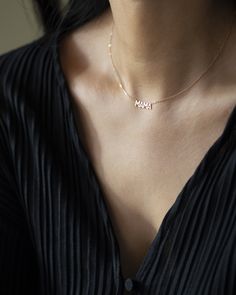 In celebration of all the great mothers around the world, treat the mom in your life to this piece of jewelry they deserve with this gold mama necklace. A perfect way to express what means most to you! Available in 14K yellow, rose or white gold Letters measure about 5mm in height Necklace total length is measured from end to end Dainty minimalist everyday necklace Minimalist Name Necklace Gift For Mom, Delicate Everyday Charm Necklaces For Mother's Day, Rose Gold Sterling Silver Necklace For Mom, Everyday Dainty Name Necklace For Mother's Day, Mother's Day Name Necklace With Birthstone, Rose Gold Fine Jewelry Necklace For Mom, Mother's Day Jewelry Gift For Mom, Minimalist 14k Gold Necklaces For Mother's Day, Sterling Silver Necklace For Mother's Day