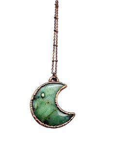 "Previews and updates, visit us on Instagram - @mergingmetals Chrysoprase Crescent Moon Necklace Called the stone of Venus, is the rarest and most valuable rich apple-green gemstone in the chalcedony family and was often mistaken for emeralds by ancient jewelers. Chrysoprase is one of the birthstones for May and has traditionally symbolized happiness, enterprise and prudence. It is a powerful stone that brings good fortune and prosperity.  Pendant measures approximately 1.75\" in height x 1.50\" Emerald Pendant Necklace Unique, Green Moon Charm Round Necklace, Green Moon Charm Necklace, Green Necklace With Moon Charm, Green Crescent Moon Charm Jewelry, Celestial Green Jewelry With Moon Charm, Handmade Green Crescent Jewelry, Emerald Pendant Necklace, Electroformed Jewelry