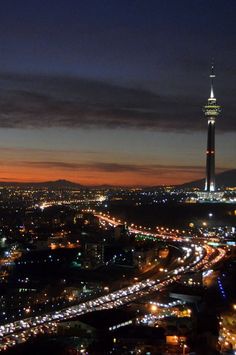 an aerial view of a city at night