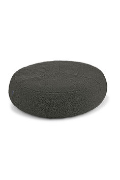 a round dog bed with a black cover on the front and bottom, sitting on a white background