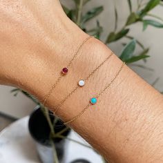 14k gold single bezel set opal bracelet SPECIFICS • 14k cable chain adjustable at 6-6.5-7"• opal is approx. 3mm Bezel Bracelet, Ruby Bracelet, Opal Bracelet, July Birthstone, October Birthstone, Ruby Gemstone, Ring Size Guide, October Birth Stone, Opal Gemstone