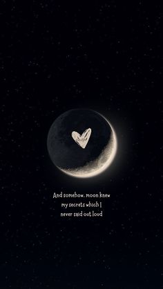 an image of the moon with a heart on it and some words written in white