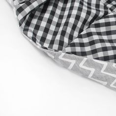 the black and white checkered fabric is folded up