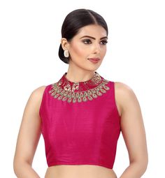 "Beautiful Silk High Neck Saree Blouse With Embroidered Pattern. Care Instructions: Hand Wash Only Fit Type: Regular This blouse is fully stitched and ready to wear available in many sizes and colours It is a sleeveless blouse and is 15\" in length The fabric used is a very beautiful polyester This blouse opens from the back with hook and eye and is lined The neckline is embroidered and it has a brocade collar PRODUCT DETAILS Auction For: 1 Blouse Color: As shown in the picture Condition: New Sa High Round Neck Blouse Design, Tank Top Blouse For Saree, Close Neck Sleeveless Blouse, Sleeveless Blouse Designs For Lehenga, High Neck Sleeveless Blouse Designs, Pink Sleeveless Blouse Saree, Pink Sleeveless Bollywood Blouse Piece, Designer Sleeveless Pink Blouse, Collar Blouse Designs