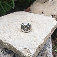 This signet ring is cast in lead-free pewter (Britannia alloy). The ring size when cast is 6. The sealing image is the phases of the moon. This is part of a series of signet rings I am making cast from lead-free pewter. Each ring is hand sculpted to give a unique, rustic style, relief image when used as a seal, with sealing wax. Symbolic Round Hand Cast Signet Ring, Hand Cast Signet Ring As Gift, Adjustable Metal Signet Ring, Polished Metal Signet Ring, Hand Cast Silver Signet Ring, Hand-cast Silver Signet Ring, Symbolic Silver Metal Signet Ring, Symbolic Silver Signet Ring, Silver Round Signet Ring