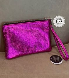 Choose the HOT PINK or FUCHSIA METALLIC WRISTLET - Lined Handmade in Australia *  shown with antique brass ykk zipper, or choose silver *  Soft luxurious pebble grain leather *  Lined in gorgeous woven fabric - choose from the photo options *  1 inside leather edged pocket for mobile phone or cards * Wristlet Size:  SMALL 7.8" x 5.5" (20 x 14 cm) MEDIUM: 9" x 6.9" (23 x 17.5 cm), (shown in photos) Removable wristlet strap 15cm across opening Turn this purse into a crossbody/shoulder bag- Add the Wristlet Size, Metallic Purse, Ykk Zipper, Leather Wristlet, Metallic Leather, Crossbody Shoulder Bag, Soft Pink, Purses And Handbags, Hot Pink