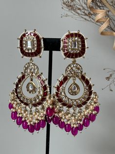 Lightweight  earrings.  Earrings length- 3.5 inches Festive Purple Chandbali Jewelry, Pink Chandbali Chandelier Earrings, Purple Kundan Earrings For Wedding, Traditional Kundan Purple Earrings, Kundan Meenakari Chandbali Hoop Earrings, Festive Purple Kundan Earrings, Traditional Purple Kundan Earrings, Traditional Purple Drop Earrings, Bollywood Style Meenakari Chandelier Earrings For Diwali