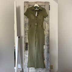 Urban Outfitters Medium Olive Green New With Tags/ Never Worn Stretchy Denim Fitted Denim Jumpsuit With Pockets And Short Sleeves, Fitted Jumpsuits And Rompers With Pockets And Short Sleeves, Fitted Cotton Denim Utility Jumpsuit, Fitted Cotton Utility Denim Jumpsuit, Fitted Short Sleeve Overalls For Workwear, Fitted Utility Jumpsuits And Rompers, Fitted Short Sleeve Overalls With Pockets, Fitted Cotton Denim Jumpsuit With Button Closure, Fitted Utility Overalls For Workwear