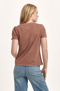 Short sleeve jersey tee, v-neck with self neck band & patch labeling in vintage garment dye wash. Solid color knit on relaxed fit. Stylish simple classic washed flawlessly, the essential pairing for your lifestyle...Body length from HPS: 23 1/2", Sleeve length: 6 1/2", Bust: 37" (Size Small) 100% COTTON Machine wash cold, Tumble dry low Imported Soft-washed Relaxed Fit V-neck Tops, Everyday Soft-washed Brown Tops, Everyday Soft-washed Brown Top, Soft-washed V-neck Relaxed Fit Top, Summer V-neck Washed Tops, Soft-washed V-neck T-shirt Relaxed Fit, Washed Organic Cotton Short Sleeve Tops, Short Sleeve Washed Organic Cotton Tops, Casual Brown Organic Cotton Tops