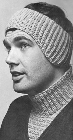 a black and white photo of a man wearing a knitted headband