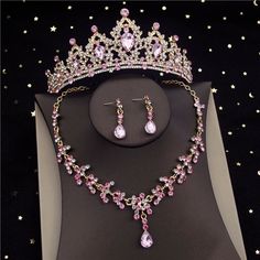 Description: Look great, feel wonderful and sophisticated, wearing this women's fashion elegant stylish luxury statement premium quality tiara crown jewelry set. You will have lots of ways to enjoy this gorgeous, versatile and beautiful jewelry set with your variety of outfits for celebration. Awesome to wear for special events like weddings, engagement parties, birthday celebrations, banquet dinners, dates and more, and also an excellent choice as a gift to you or to your loved ones. Details: C Crown Pageant, Wedding Dubai, Rhinestone Veil, Pink Jewelry Set, Bridal Jewelry Sets Brides, Bride Jewelry Set, Crystal Bridal Tiaras, Silver Tiara, Bride Necklace