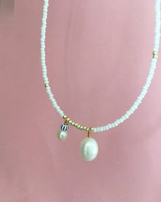 Dainty White Pearl Necklaces, Feminine White Pearl Chain Necklace, Dainty White Pearl Drop Necklace, Dainty Pearl White Beaded Necklaces With Pearl Chain, Minimalist Beaded Necklace With Pearl Drop, Dainty White Necklace With Pearl Drop, Delicate White Necklace With Pearl Charm, Feminine White Pearl Drop Necklace, White Feminine Pearl Drop Necklace