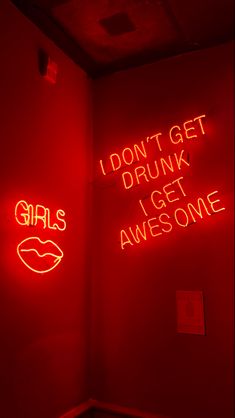 two neon signs that say i don't get drunk, i get awesome