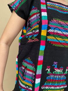 "Stunning hand-women huipil from Oaxaca, it is made in a backstrap loom. Definitely a piece of art that you can style with jeans, leather leggins, pencil skirt, etc. Made of Mexican textile. Fabric is thick. Same motif on the front and back. Fits size Medium (Maybe a Large, check measurements below) Measurements taken flat: Width 22\" Shouldet to bottom hem 26 3/4\"" Multicolor Tops For Cinco De Mayo Festival, Multicolor Top For Cinco De Mayo Festival, Folk Style Multicolor Tops For Cinco De Mayo, Multicolor Folk Tops For Cinco De Mayo, Multicolor Bohemian Tops For Fiesta, Traditional Blouse For Cinco De Mayo Fiesta, Multicolor Tops For Cinco De Mayo Fiesta, Mexican Textiles, Mexican Blouse