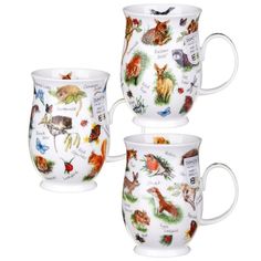 three coffee mugs with animals on them