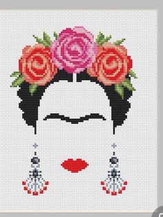 a cross stitch pattern with a woman's face and flowers on her head