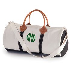 Our canvas round duffel bag with leather handles is great to travel with. Duffel has a zip closure, 2 inner pockets, 15" leather handles and a shoulder strap. Dimensions 10.5" H x 21.25" W x 10.5" D.

Embroidered in your choice of personalization style and thread color. Positioning only as shown. Packing Bags Travel, Boat Tote, Round Canvas, Pink Monogram, Travel Duffel, Celine Bag, Overnight Bag, Garment Bags, Black Bag