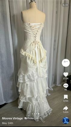 a white dress with ruffles on it