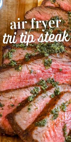 grilled steaks with herbs and seasoning on top