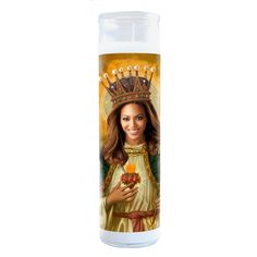 a candle with a painting of a woman wearing a crown and holding a flower in her hand