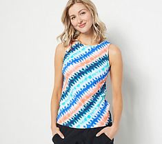 It's a tankini top that provides full coverage and a stylish look. So, yeah, we're exited about it. Whether you're lounging at the pool or reading on the beach, it's a must-have for this summer! From Lands' End. Reading On The Beach, 2 Piece Swimsuits, Tankini Top, Swimwear Fashion, For Today, Lands End, Upf 50, Tankini, This Summer