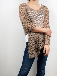 This crocheted beautiful poncho is a perfect item for Summer/ Fall that you want to feel a little warmer on a morning or evening. It also can be wear in winter as a scarf. Size: one size fit most. (US 0-12) Hand wash only and lay flat to dry. I have other colors for this poncho. Pls. Check my shop for details: http://www.etsy.com/shop/MaxMelody?section_id=7175104 Made to order. Pls. Allow me 1-2 weeks to make it. Thanks for stop by my shop! Knitted Shawl Pattern For Fall, Hand Knitted Knit Shawl For Fall, Crochet Wrap, One Size For Winter, Hand Knitted One Size Wraps For Fall, Winter Open Knit Poncho, One Size Crochet Wrap For Winter, Crochet Wraps One Size For Winter, Fall Knitted Shawl, Hand Knitted Winter Wraps